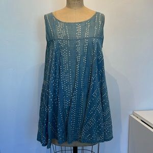 Pale blue natural indigo dyed shibori tank with flowy hem